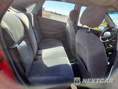 Zdjęcie 10 z 12 samochodu: 2002 FORD FOCUS LX VIN:1FAFP33P32W313680 - miniatura