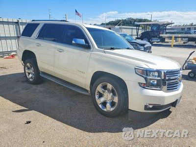 Czwarte zdjęcie samochodu z boku: 2015 CHEVROLET TAHOE C1500 LTZ VIN:1GNSCCKC0FR108610 - miniatura
