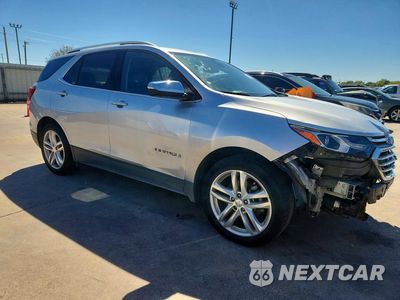 Czwarte zdjęcie samochodu z boku: 2018 CHEVROLET EQUINOX PREMIER VIN:3GNAXNEX2JS638223 - miniatura