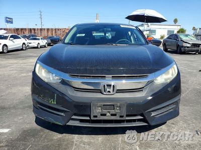 Piąte zdjęcie samochodu w środku: 2017 HONDA CIVIC LX VIN:19XFC2F57HE202952 - miniatura