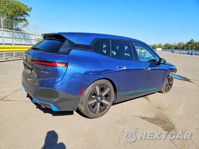 Trzecie zdjęcie samochodu z tyłu: 2023 BMW IX XDRIVE50 VIN:WB523CF09PCM23673 - miniatura