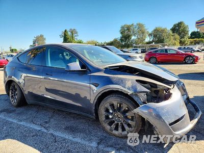 Czwarte zdjęcie samochodu z boku: 2022 TESLA MODEL Y VIN:7SAYGDEE9NF355870 - miniatura