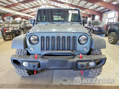 Piąte zdjęcie samochodu w środku: 2015 JEEP WRANGLER UNLIMITED SPORT VIN:1C4BJWDG0FL529584 - miniatura