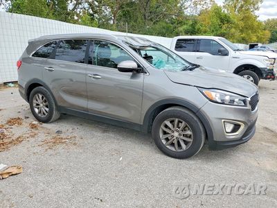 Czwarte zdjęcie samochodu z boku: 2016 KIA SORENTO LX VIN:5XYPG4A38GG128291 - miniatura