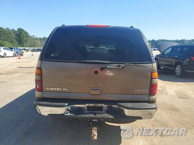 Zdjęcie 6 z 13 samochodu: 2003 GMC YUKON XL K1500 VIN:1GKFK16Z53J318571 - miniatura