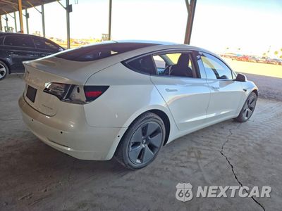 Trzecie zdjęcie samochodu z tyłu: 2021 TESLA MODEL 3 VIN:5YJ3E1EB7MF979327 - miniatura