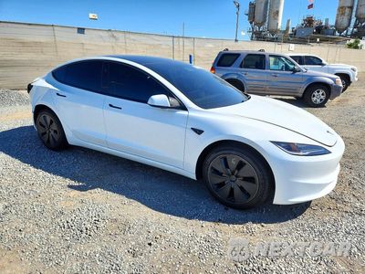 Czwarte zdjęcie samochodu z boku: 2026 TESLA MODEL 3 VIN:5YJ3E1EA3TF149711 - miniatura