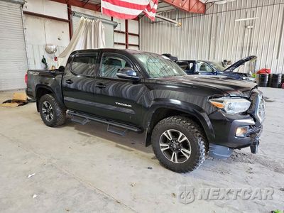 Czwarte zdjęcie samochodu z boku: 2017 TOYOTA TACOMA TRD SPORT VIN:3TMCZ5AN2HM095096 - miniatura