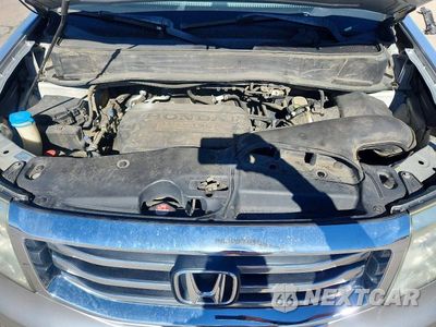 Zdjęcie 12 z 13 samochodu: 2013 HONDA PILOT EX VIN:5FNYF4H43DB002882 - miniatura