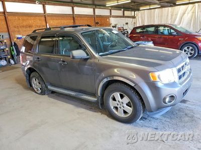 Czwarte zdjęcie samochodu z boku: 2011 FORD ESCAPE XLT VIN:1FMCU9DG9BKB01182 - miniatura