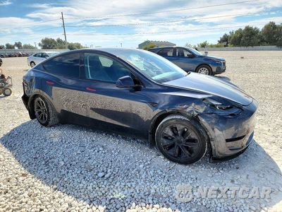 Czwarte zdjęcie samochodu z boku: 2024 TESLA MODEL Y VIN:7SAYGDEE7RA309280 - miniatura