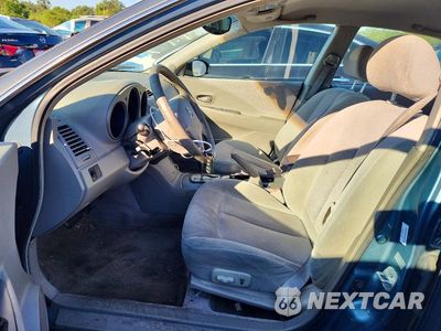 Zdjęcie 7 z 12 samochodu: 2002 NISSAN ALTIMA VIN:1N4AL11D32C141560 - miniatura