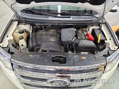 Zdjęcie 12 z 13 samochodu: 2014 FORD EDGE SEL VIN:2FMDK4JC8EBA88471 - miniatura