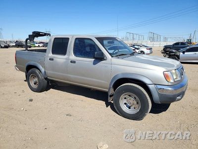 Czwarte zdjęcie samochodu z boku: 2000 NISSAN FRONTIER XE VIN:1N6ED27T9YC320253 - miniatura