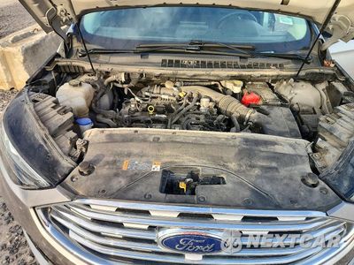 Zdjęcie 12 z 13 samochodu: 2022 FORD EDGE TITANIUM VIN:2FMPK4K91NBB04963 - miniatura