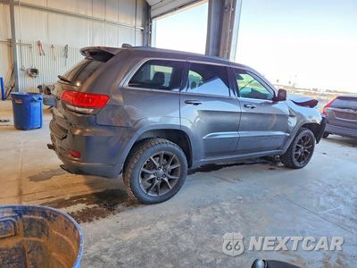 Trzecie zdjęcie samochodu z tyłu: 2014 JEEP GRAND CHEROKEE SUMMIT VIN:1C4RJFJG7EC329674 - miniatura