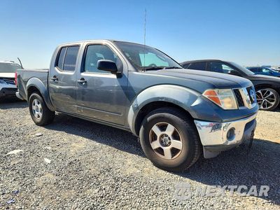 Czwarte zdjęcie samochodu z boku: 2005 NISSAN FRONTIER SE VIN:1N6AD07U65C454838 - miniatura