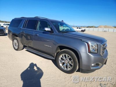 Czwarte zdjęcie samochodu z boku: 2019 GMC YUKON XL K1500 SLT VIN:1GKS2GKC4KR376495 - miniatura