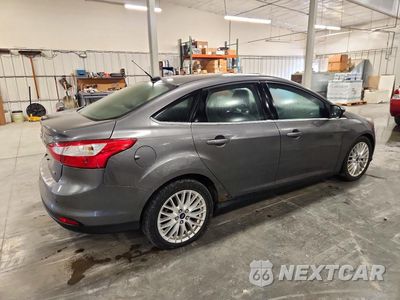 Trzecie zdjęcie samochodu z tyłu: 2012 FORD FOCUS SEL VIN:1FAHP3H2XCL321994 - miniatura
