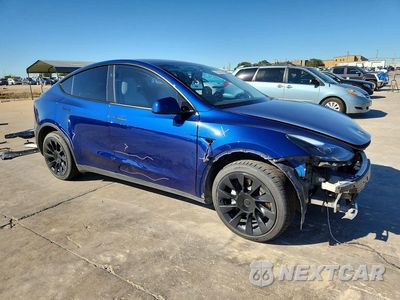 Czwarte zdjęcie samochodu z boku: 2024 TESLA MODEL Y VIN:7SAYGDEE4RA217348 - miniatura