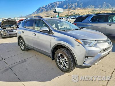 Czwarte zdjęcie samochodu z boku: 2018 TOYOTA RAV4 HYBRID XLE VIN:JTMRJREV8JD175748 - miniatura