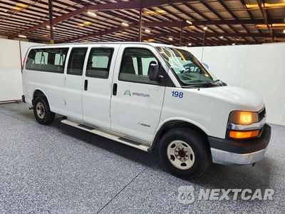 Czwarte zdjęcie samochodu z boku: 2006 CHEVROLET EXPRESS G3500 VIN:1GAHG39U161207918 - miniatura
