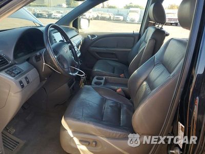 Zdjęcie 7 z 14 samochodu: 2010 HONDA ODYSSEY EXL VIN:5FNRL3H7XAB024780 - miniatura