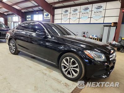 Czwarte zdjęcie samochodu z boku: 2017 MERCEDES-BENZ C 300 4MATIC VIN:55SWF4KB1HU211959 - miniatura