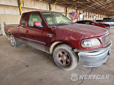 Czwarte zdjęcie samochodu z boku: 2003 FORD F150 VIN:1FTRX17W03NA76215 - miniatura