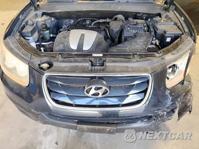 Zdjęcie 12 z 13 samochodu: 2011 HYUNDAI SANTA FE GLS VIN:5XYZGDAG4BG071012 - miniatura