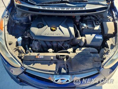 Zdjęcie 11 z 12 samochodu: 2013 HYUNDAI ELANTRA COUPE GS VIN:KMHDH6AE8DU005349 - miniatura
