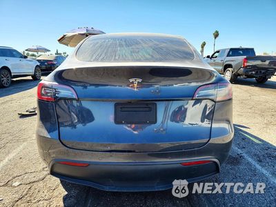 Zdjęcie 6 z 13 samochodu: 2022 TESLA MODEL Y VIN:7SAYGDEE9NF355870 - miniatura