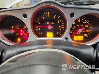 Zdjęcie 9 z 12 samochodu: 2004 NISSAN 350Z BASE VIN:JN1AZ34D04M103431 - miniatura