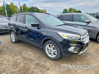 Czwarte zdjęcie samochodu z boku: 2017 FORD ESCAPE SE VIN:1FMCU9G93HUB55524 - miniatura