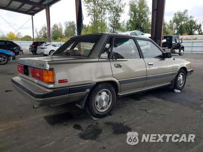 Trzecie zdjęcie samochodu z tyłu: 1986 TOYOTA CAMRY LE VIN:JT2SV16E2G0517886 - miniatura