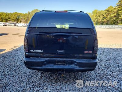 Zdjęcie 6 z 13 samochodu: 2001 GMC YUKON VIN:1GKEK13T41R134796 - miniatura