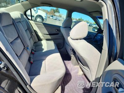Zdjęcie 10 z 13 samochodu: 2003 NISSAN MAXIMA GXE VIN:JN1DA31D43T525019 - miniatura
