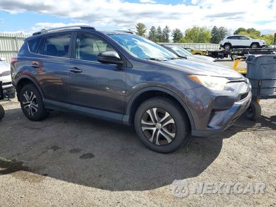 Czwarte zdjęcie samochodu z boku: 2017 TOYOTA RAV4 LE VIN:JTMBFREV4HJ148822 - miniatura