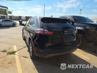 Trzecie zdjęcie samochodu z tyłu: 2023 FORD EDGE SEL VIN:2FMPK4J97PBA47656 - miniatura