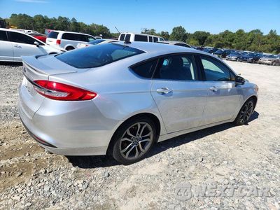 Trzecie zdjęcie samochodu z tyłu: 2017 FORD FUSION SE HYBRID VIN:3FA6P0LU6HR382329 - miniatura