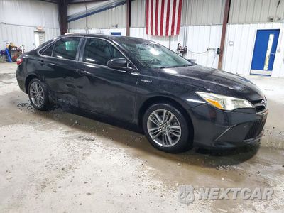 Czwarte zdjęcie samochodu z boku: 2016 TOYOTA CAMRY HYBRID SE VIN:4T1BD1FK7GU199512 - miniatura
