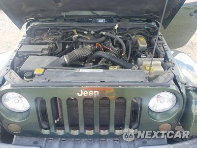 Zdjęcie 11 z 12 samochodu: 2008 JEEP WRANGLER UNLIMITED SAHARA VIN:1J4GA59138L537650 - miniatura