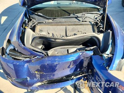 Zdjęcie 12 z 14 samochodu: 2022 TESLA MODEL Y VIN:7SAYGDEF5NF563415 - miniatura