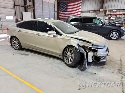 Czwarte zdjęcie samochodu z boku: 2017 FORD FUSION TITANIUM VIN:3FA6P0K90HR157949 - miniatura