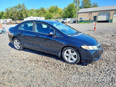 Czwarte zdjęcie samochodu z boku: 2009 HONDA CIVIC LX-S VIN:19XFA16679E043182 - miniatura