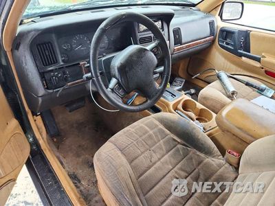 Zdjęcie 8 z 13 samochodu: 1997 JEEP GRAND CHEROKEE LAREDO VIN:1J4FX58S7VC724129 - miniatura
