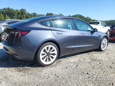 Trzecie zdjęcie samochodu z tyłu: 2023 TESLA MODEL 3 VIN:5YJ3E1EA1PF435871 - miniatura