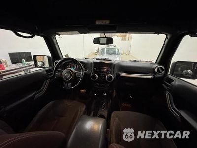 Zdjęcie 9 z 10 samochodu: 2017 JEEP WRANGLER UNLIMITED SAHARA VIN:1C4BJWEG5HL559083 - miniatura