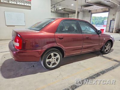 Trzecie zdjęcie samochodu z tyłu: 2003 MAZDA PROTEGE DX VIN:JM1BJ225330156922 - miniatura