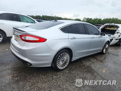 Trzecie zdjęcie samochodu z tyłu: 2014 FORD FUSION TITANIUM VIN:3FA6P0K9XER208840 - miniatura